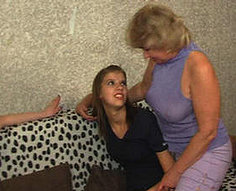 Mother and elder sister fill sister's young twat with a strapon